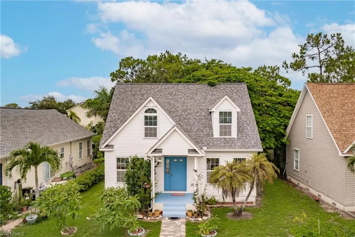 View of front of house with a front lawn