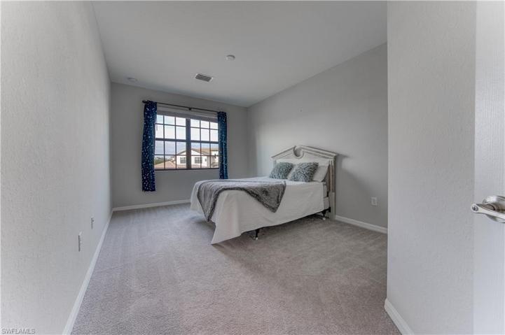 2nd guest bedroom with walk-in closet