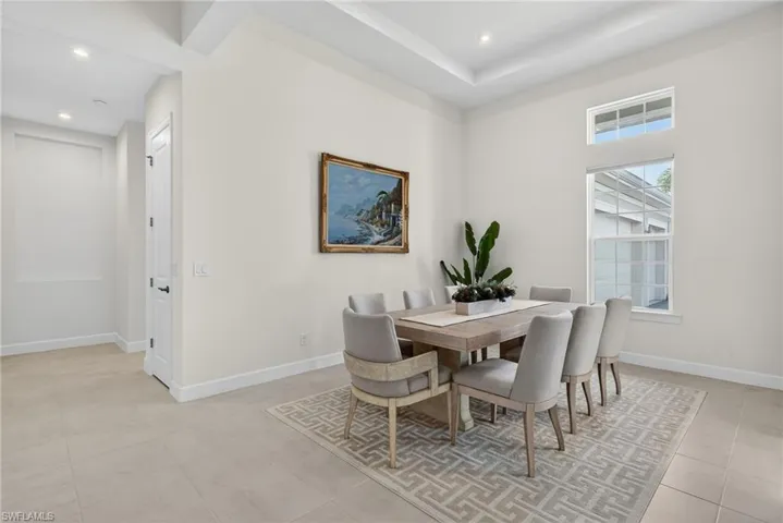Dining space featuring baseboards and recessed lighting