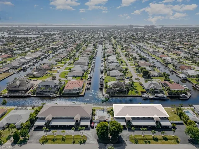 Aerial view of residential area with a nearby body of water