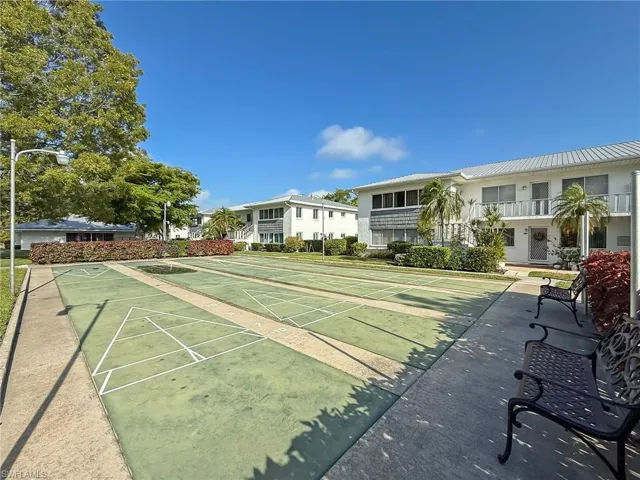 View of community with a residential view and shuffleboard