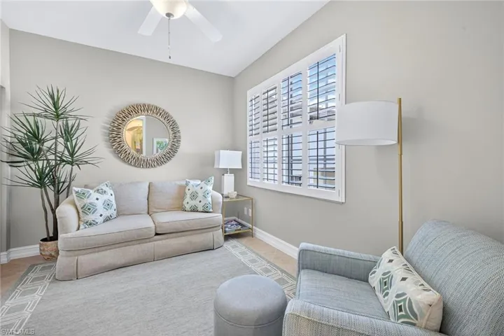 This room is set up as an office. It has a closet & pocket door with a pull out couch. Easily transformed in to a 3rd bedroom.