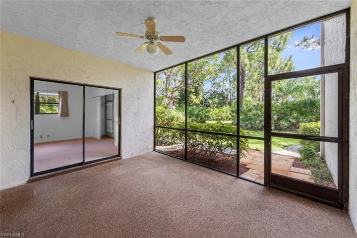 Lanai with ceiling fan and view to master bedroom