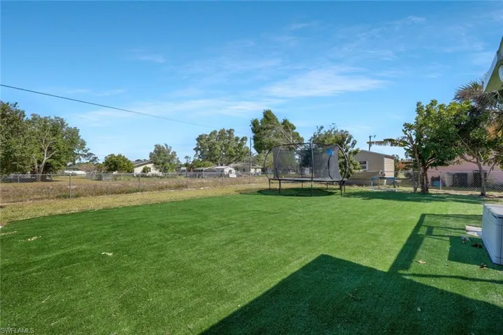 View of yard with  fence
