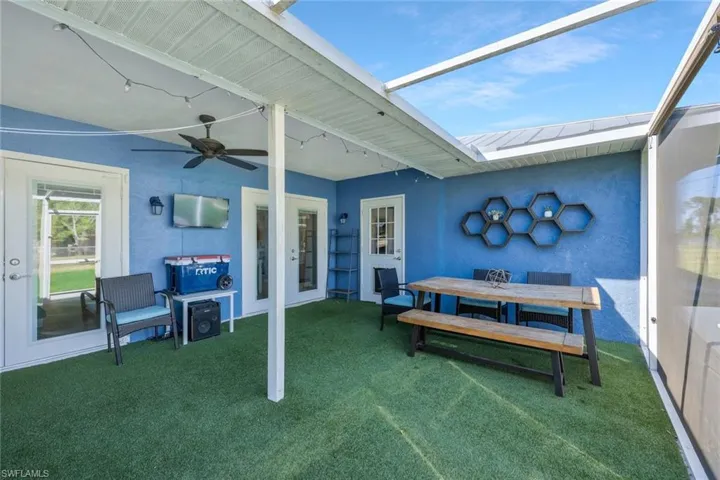 View of patio / terrace featuring outdoor dining space and a ceiling fan