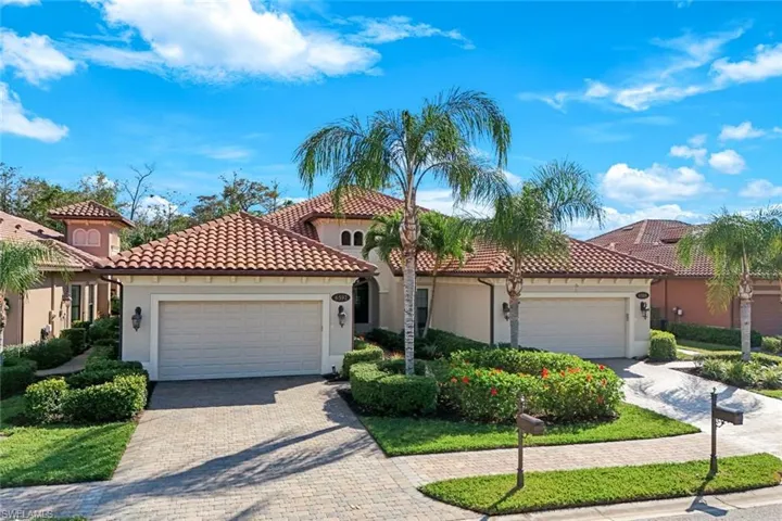 Mediterranean/spanish-style house featuring an attached 2-car garage