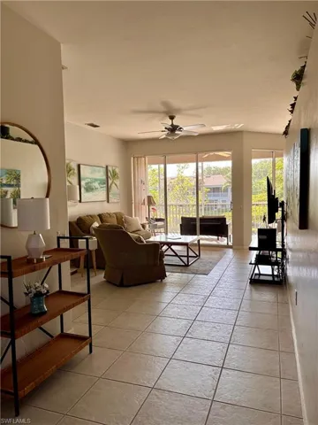 Spacious living room with a triple slider to the lanai.