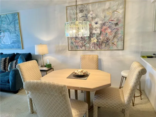 Dining area featuring carpet flooring