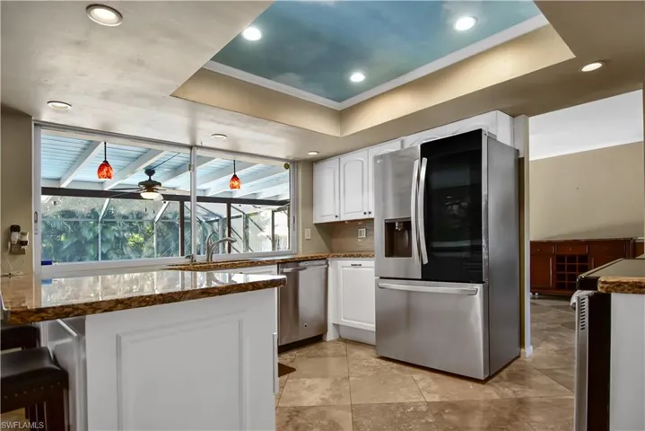 Kitchen with a French Door Refrigerator with InststaView Door-in-Door technology, letting you quickly assess inventory while preventing cold air from escaping, which helps keep food fresher, longer.