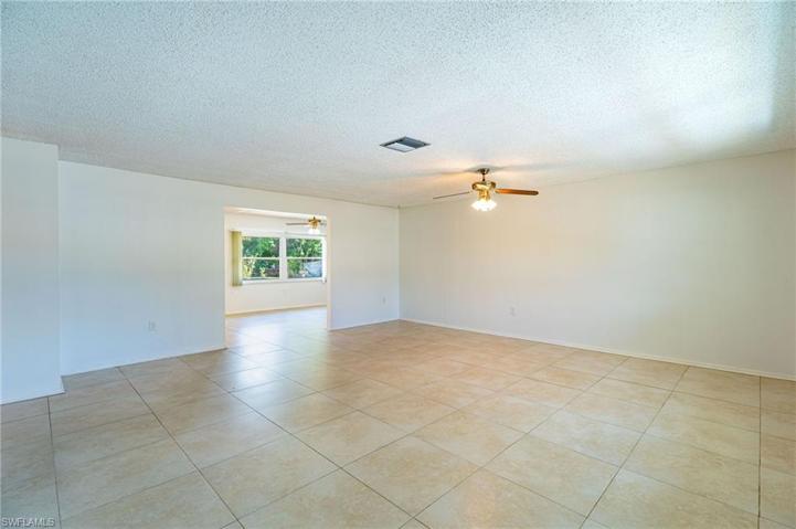 Living room facing entry into Dining area