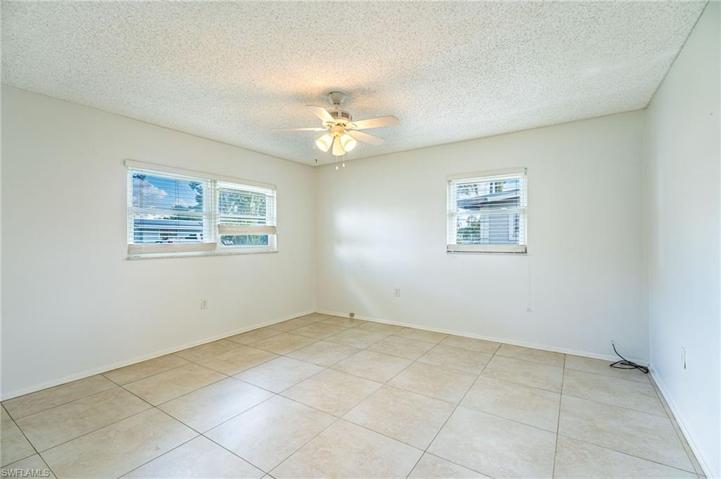 Nice size owner's bedroom with tile throughout.