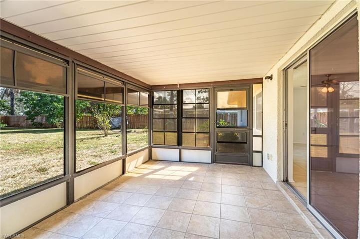 Screen in lanai with tiled floors.