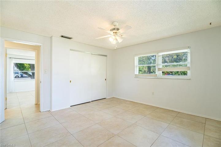Nice size owner's bedroom with tile throughout.