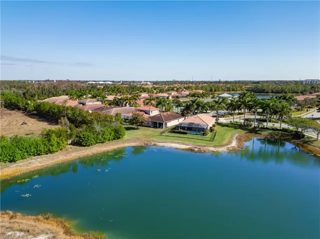 Aerial view of residential area with a nearby body of water