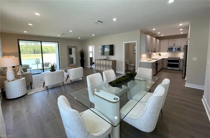 THE ASTER (A)1-STORY VILLA • 3 BEDROOMS  2.5 BATHROOMS 1-CAR GARAGE 1,590 INTERIOR SQ. FT. 1,946 TOTAL SQ. FT.