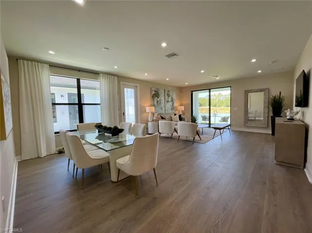 THE ASTER (A)1-STORY VILLA • 3 BEDROOMS  2.5 BATHROOMS 1-CAR GARAGE 1,590 INTERIOR SQ. FT. 1,946 TOTAL SQ. FT.