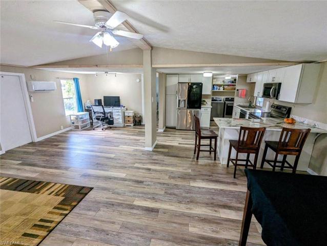 Open Floor plan featuring living room, dining and kitchen
