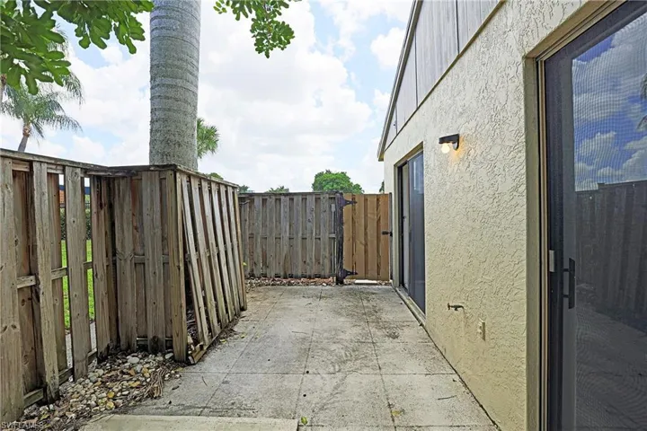 View of patio / terrace with a gate
