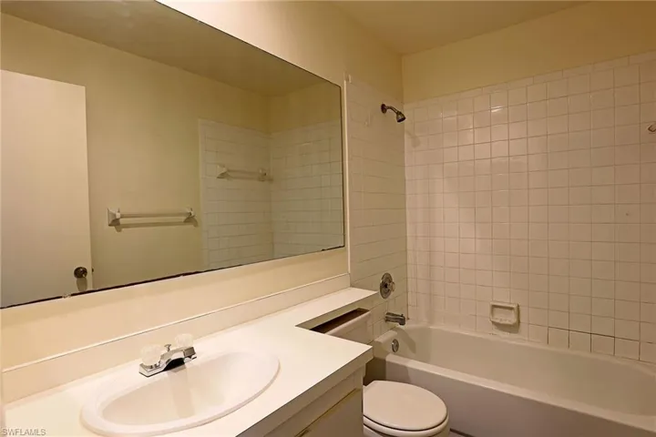Full bath featuring vanity and tub / shower combination