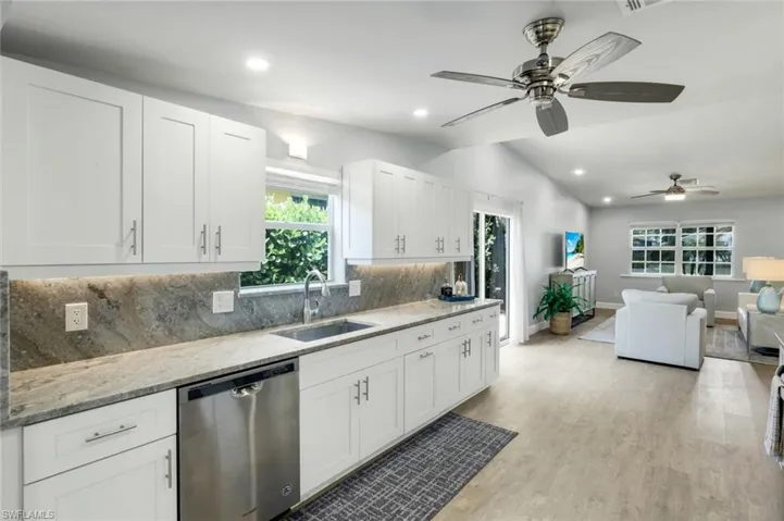 Gourmet kitchen with granite countertops and stainless appliances