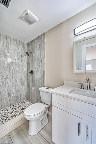 New, shower, cabinet/sink, toilet and flooring