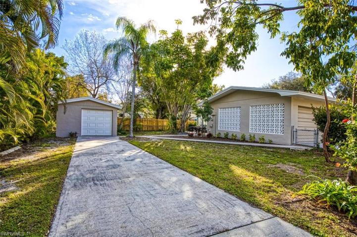 detached garage with its own driveway