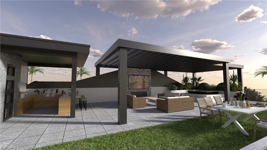 Planned Patio terrace at dusk with an outdoor living space with a fireplace and a patio area