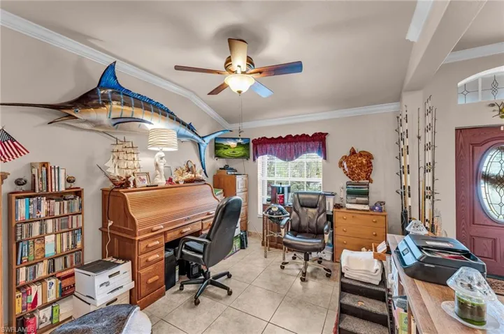Formal living room currently being used as office