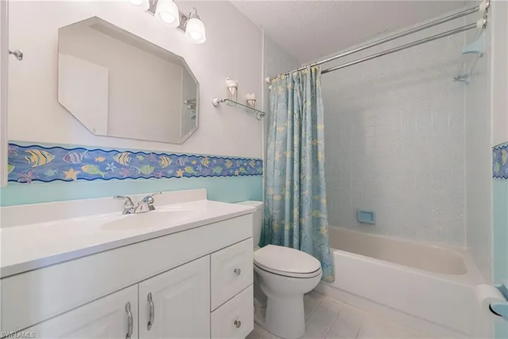 Guest bathroom with tub/shower conbo