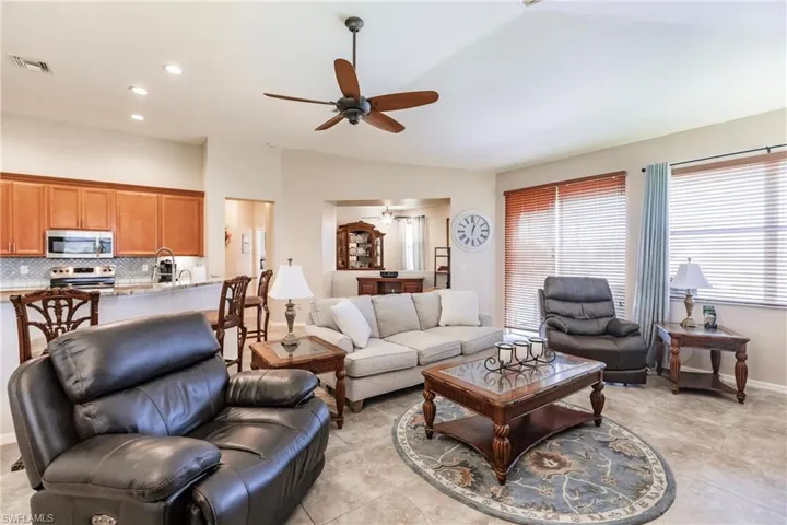 Tiled living room with ceiling fan