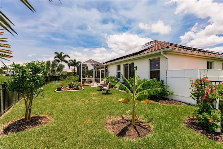 View of yard with a lanai