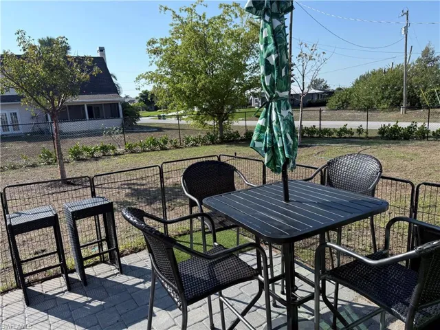 View of patio with outdoor dining space