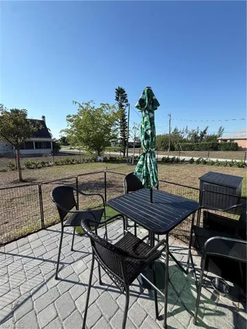 View of patio featuring outdoor dining area