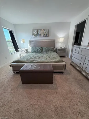 Bedroom with carpet