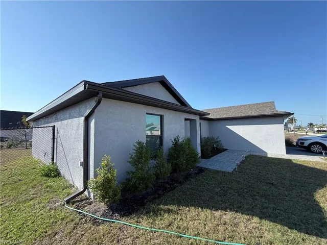 View of home's exterior with stucco siding