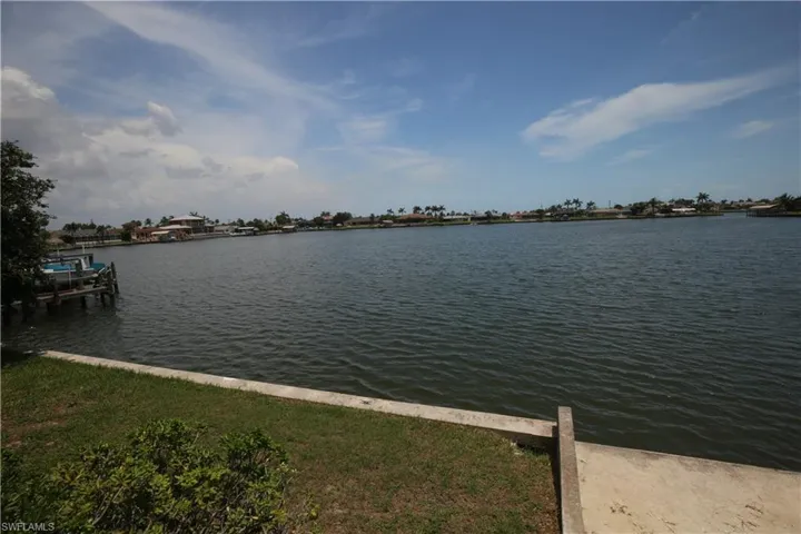 Great water view, high vaulted ceiling, and healthy amount of natural light