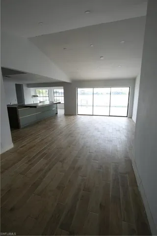 Bedroom featuring marble look tiles and recessed lighting