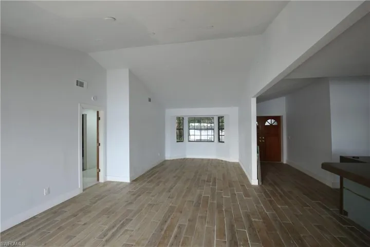 center island, and vaulted ceiling