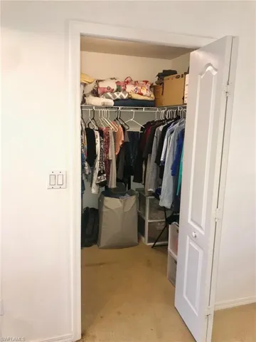 Spacious master bedroom walk-in closet