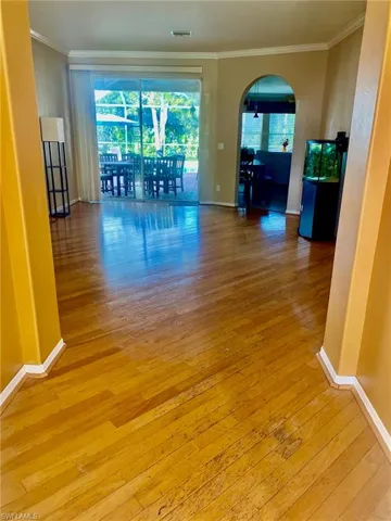 Living room with sliders to porch and pool