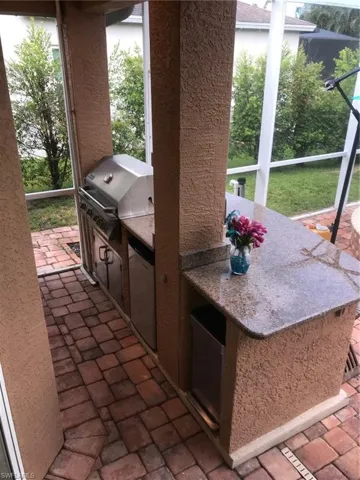 Outdoor kitchen with grill