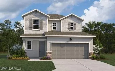Craftsman-style house featuring a front lawn, concrete driveway, and a garage