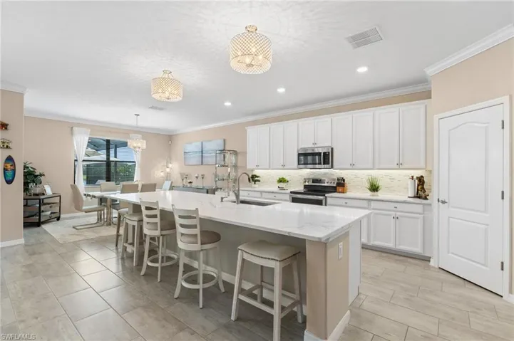 Open kitchen with huge quartz island