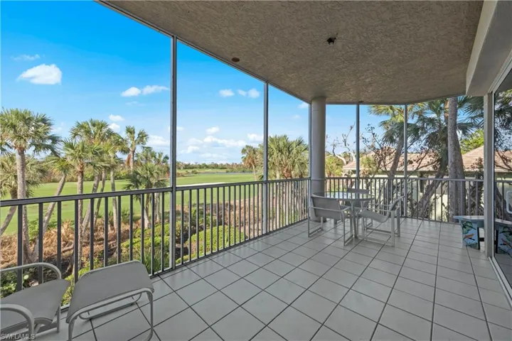 Unfurnished sunroom with golf course view