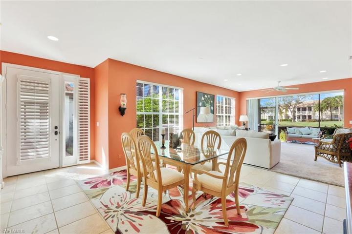Entryway leading to the living and dining areas. Notice all of the windows!