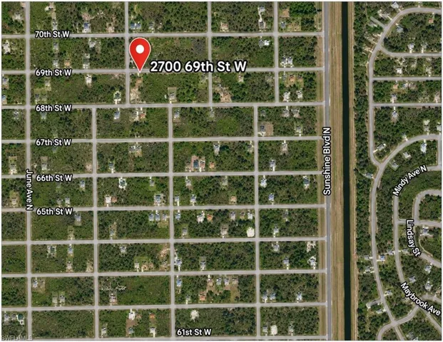 Aerial Property Map. Displaying the geographic location and street address of the property within the municipal grid system