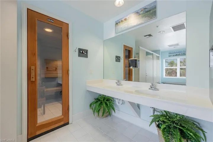Bathroom featuring vanity and tile patterned floors