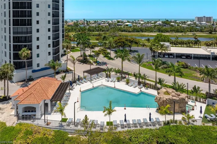 View of swimming pool featuring a water view
