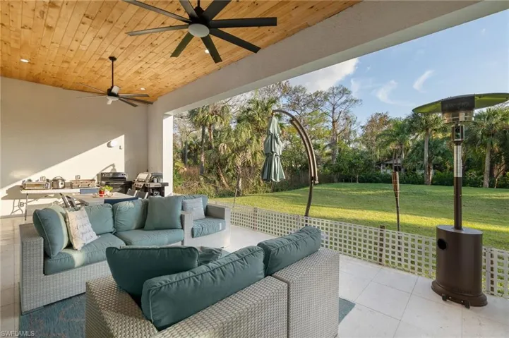 View of patio / terrace with ceiling fan and an outdoor living space