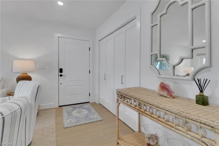 Foyer entrance featuring light wood-type flooring and recessed lighting